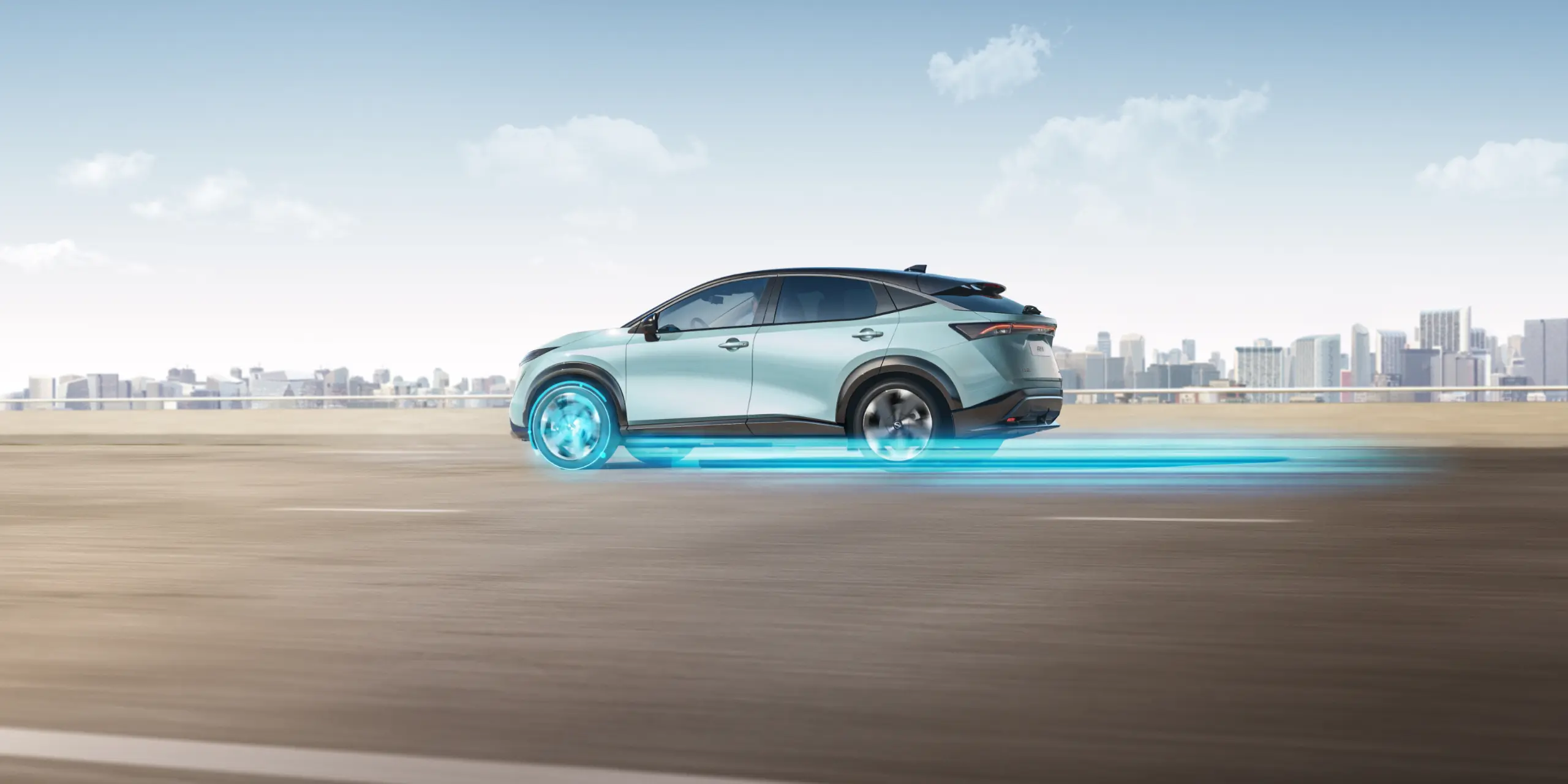 100 % elektrisk SUV Nissan ARIYA sett fra siden i bevegelse