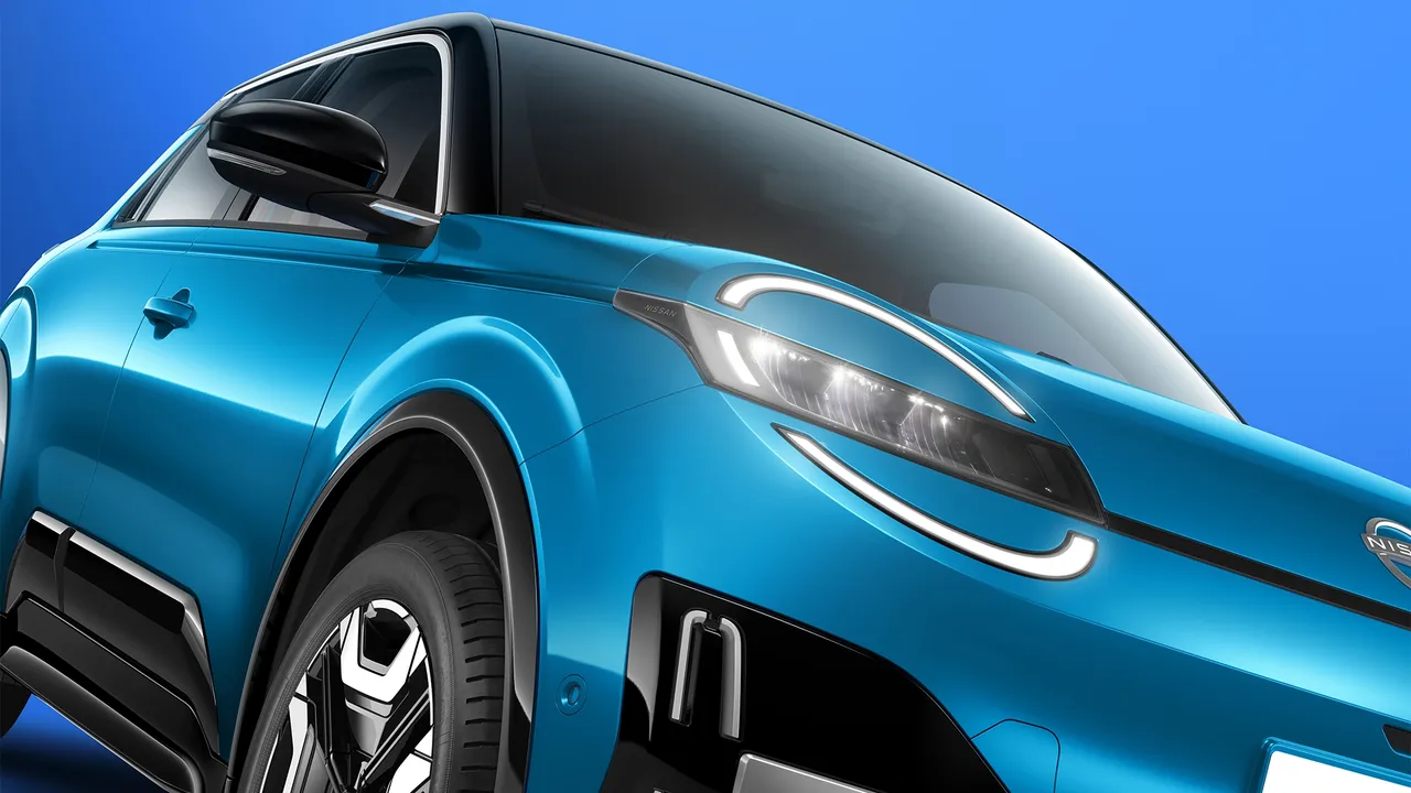 A sleek, blue electric Nissan MICRA with distinctive LED headlights and a glossy finish, set against a bright blue background.